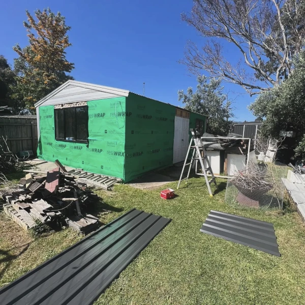 outdoor shed with old cladding removed