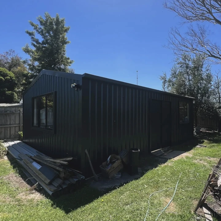 outdoor shed with brand new metal cladding